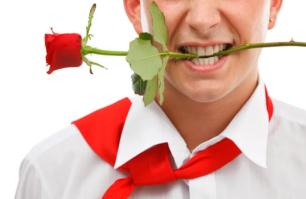 Muž s růží v ústech — Stock fotografie