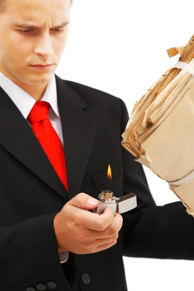 Young man burning file folder — Stock Photo, Image