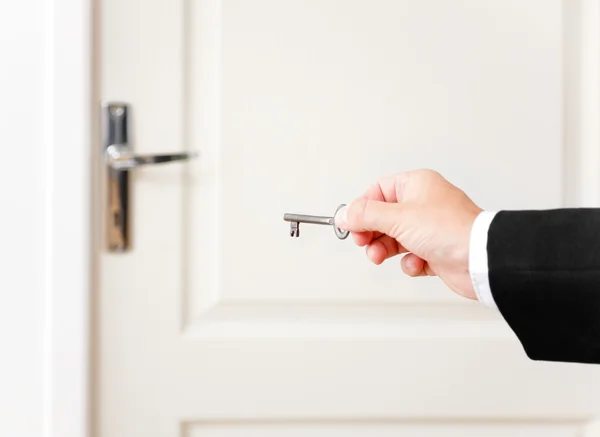 The key to open a door — Stockfoto