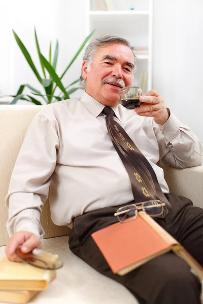 Happy senior man drinking coffee — Stock Photo, Image