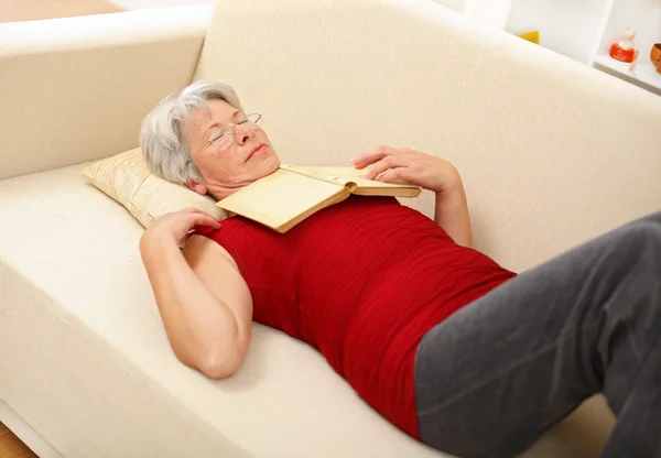 stock image Senior woman sleeping on sofa