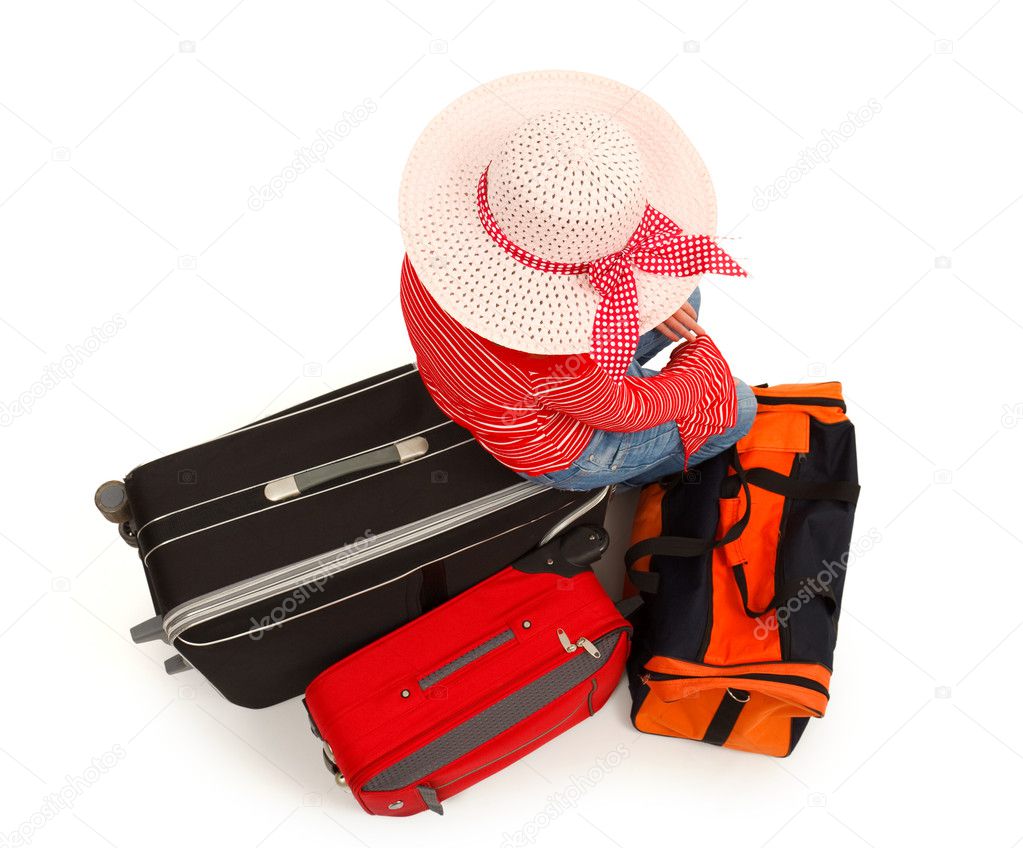 Young girl with luggages