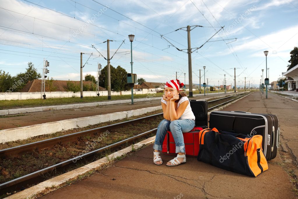 Young girl in train station — Stock Photo © erierika #4012175