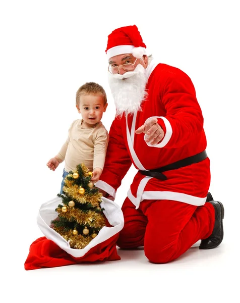 stock image Santa claus and little boy looking at us