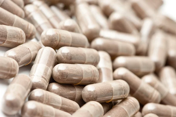 Pillole medicinali ammucchiati un sacco — Foto Stock