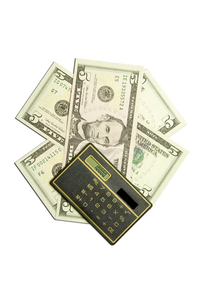 Калькулятор і доларові купюри — стокове фото