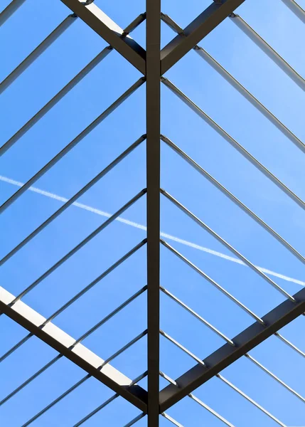 Symmetric (triangle) roof made of steel with lights and shadows — Stock Photo, Image