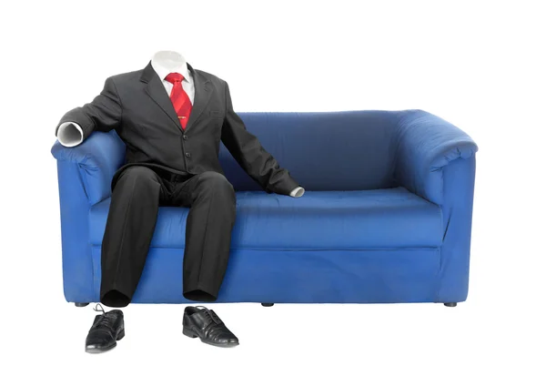 stock image Ghost of the man in classic suit is sitting on a blue couch. Isolated over white