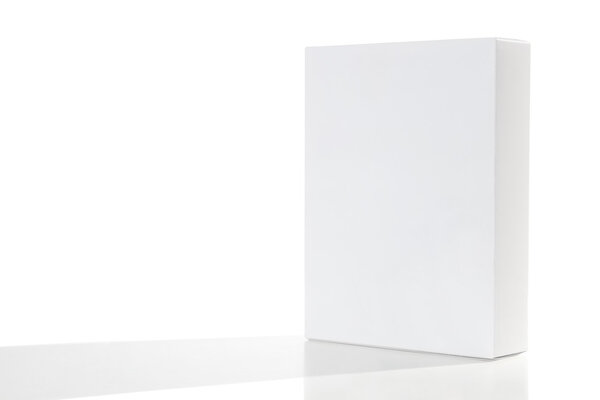 Blank vertical cardboard box with shadow and reflection isolated over white background