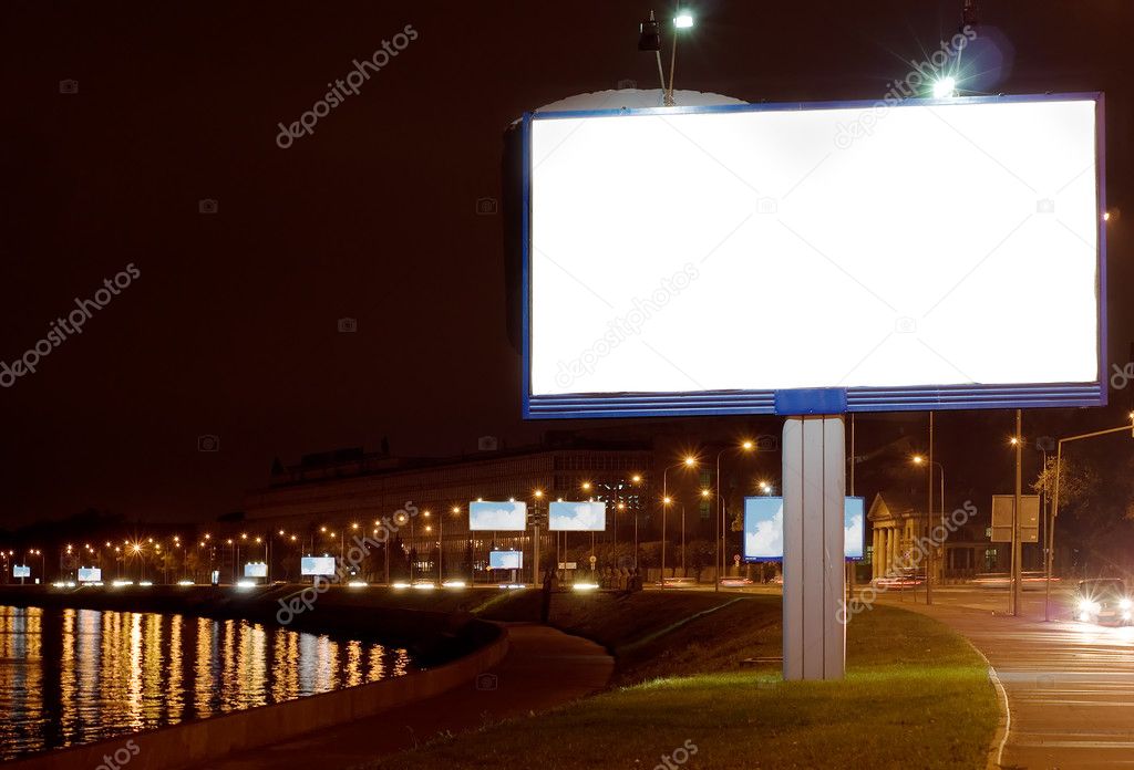 The big white bill-board on night quay