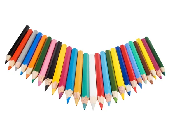 Um monte de lápis de cor no fundo branco — Fotografia de Stock
