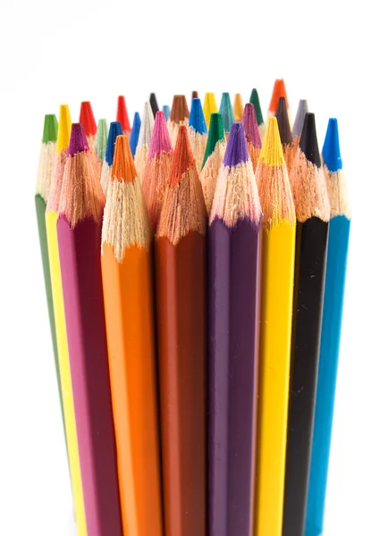 Um monte de lápis de cor no branco — Fotografia de Stock