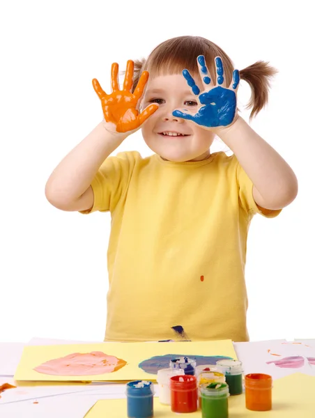 Criança bonito com as mãos pintadas — Fotografia de Stock