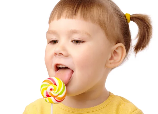 Little girl with lollipop Royalty Free Stock Images