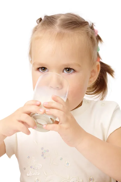 Little girl drinks milk Royalty Free Stock Images