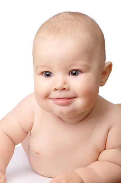 Kisgyermek boldog, mosolyog, a nyelv kilóg — Stock Fotó