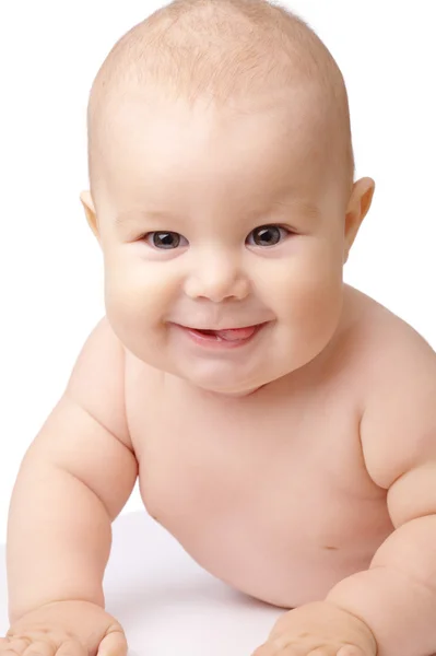 Criança feliz sorrindo, colando a língua para fora — Fotografia de Stock