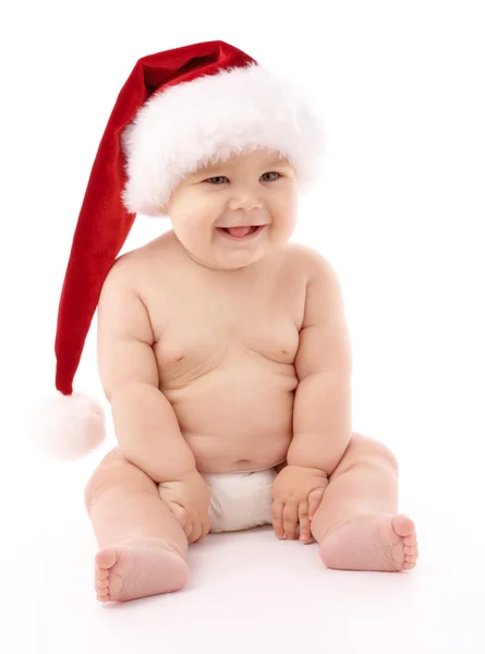 Petit enfant portant un bonnet de Noël rouge — Photo