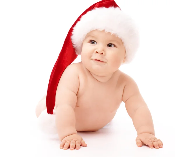 Malé dítě nosit červené vánoční čepice — Stock fotografie