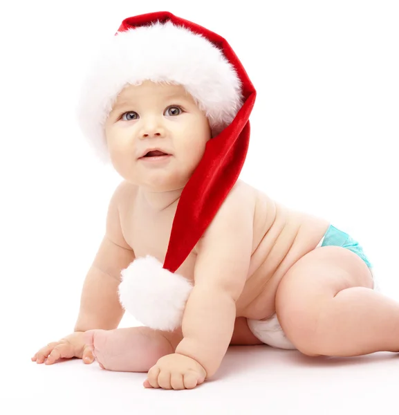 Niño pequeño con gorra roja de Navidad — Foto de Stock