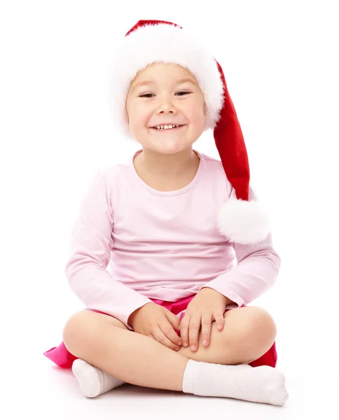 Dziewczynka w czerwonej czapce Boże Narodzenie — Zdjęcie stockowe