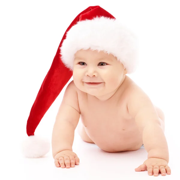 Little child wearing red Christmas cap Stock Picture