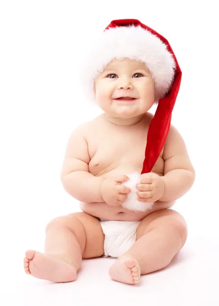 빨간 크리스마스 모자를 쓰고 어린 아이 — 스톡 사진
