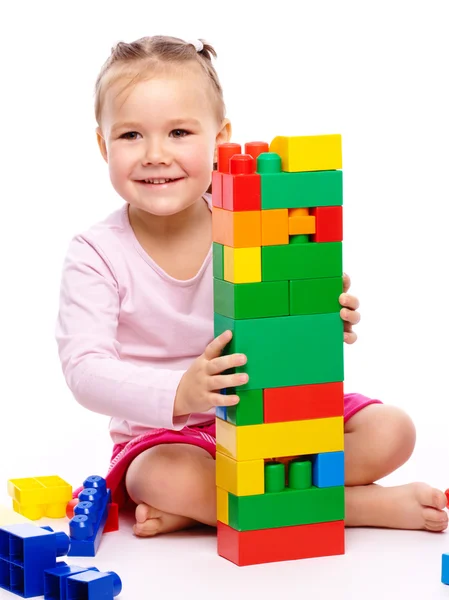 Kislány építési tégla — Stock Fotó