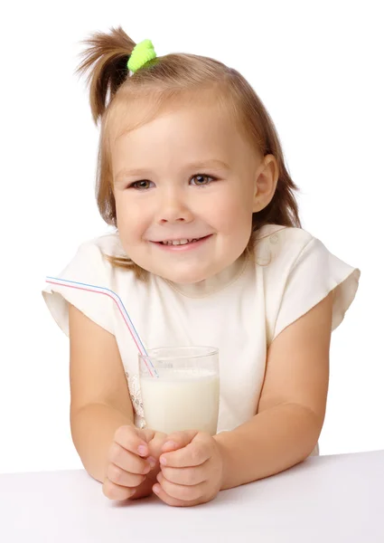 Little girl with a glass of milk — Stock Photo, Image