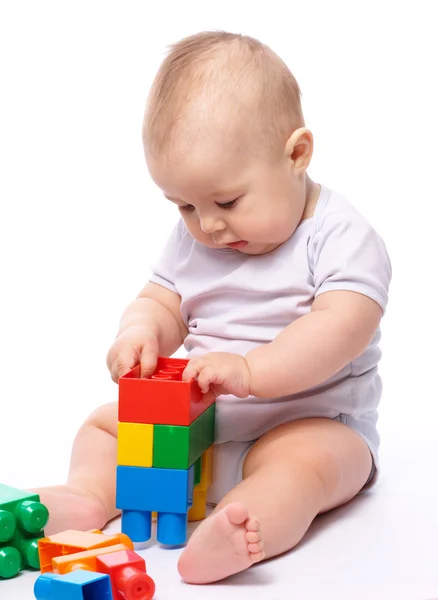 Little boy with building bricks — Stock Photo, Image