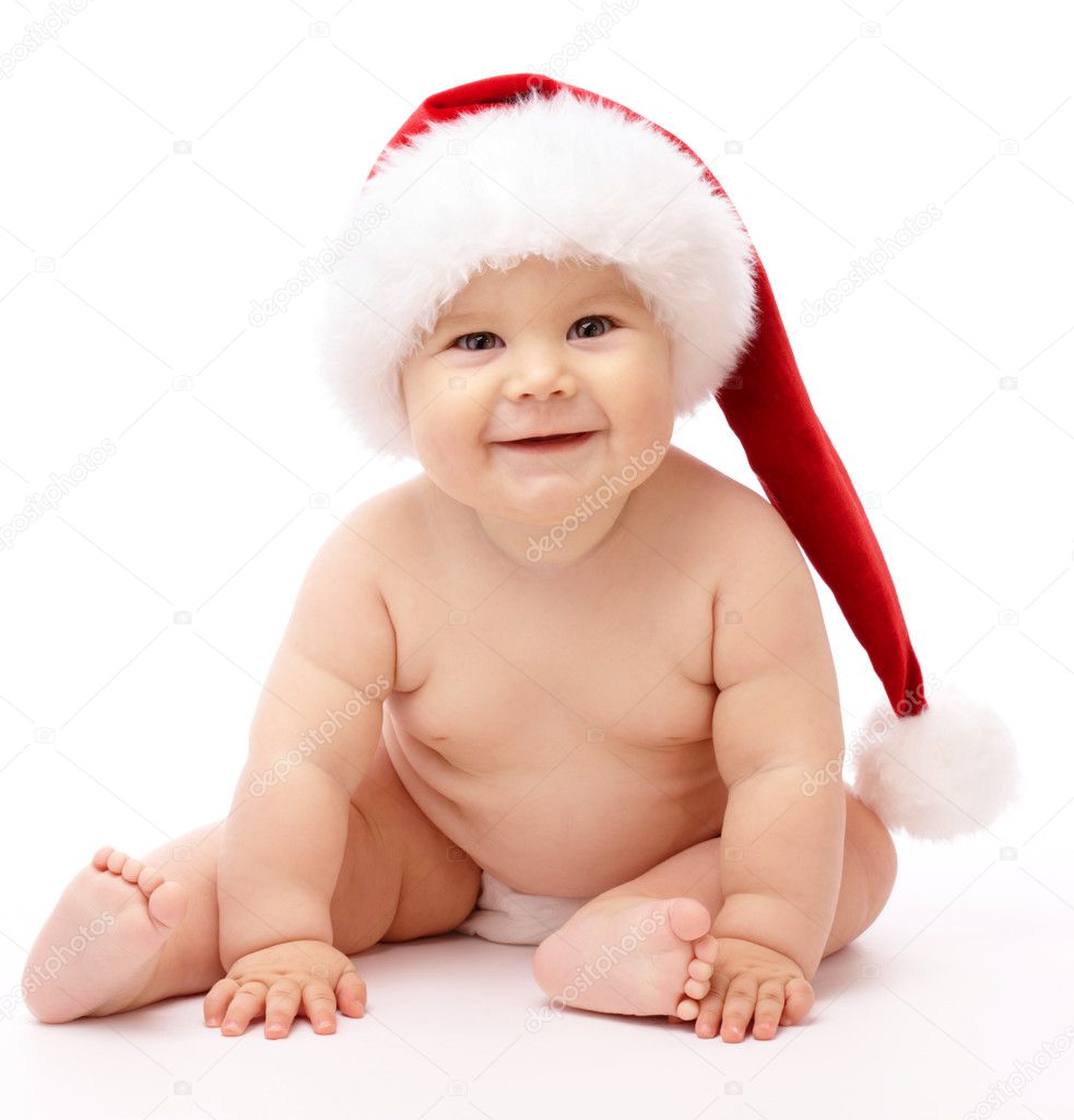 Little child wearing red Christmas cap