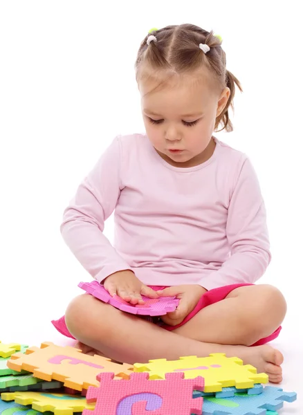 Little girl with alphabet — Stock Photo, Image