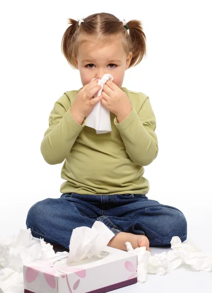 Little girl blows her nose — Stock Photo, Image