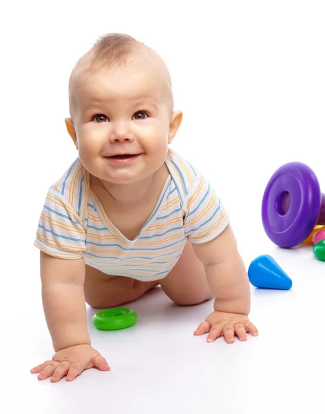 Ładny Mały Chłopiec Bawi Się Zabawki Siedząc Podłodze Białym Tle — Zdjęcie stockowe