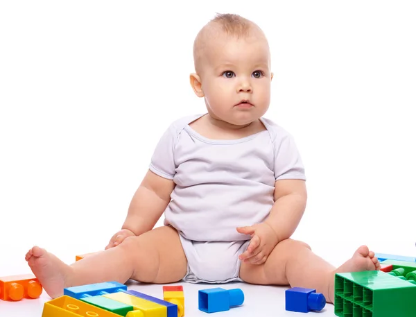 Cute Little Boy Playing Building Bricks While Sitting Floor Isolated Royalty Free Stock Images