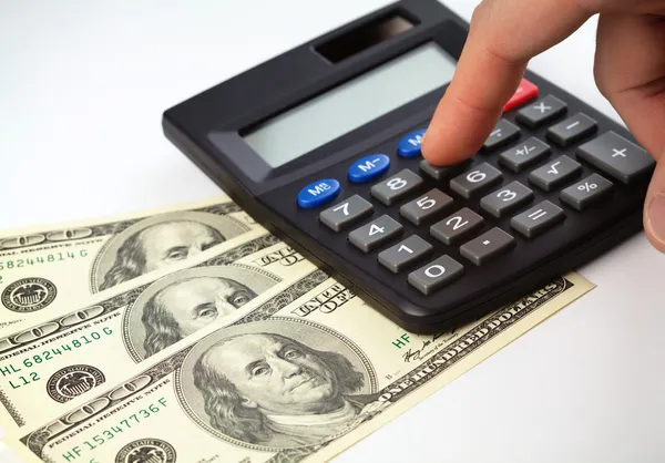 Calcolatrice e denaro - concetto di contabilità — Foto Stock