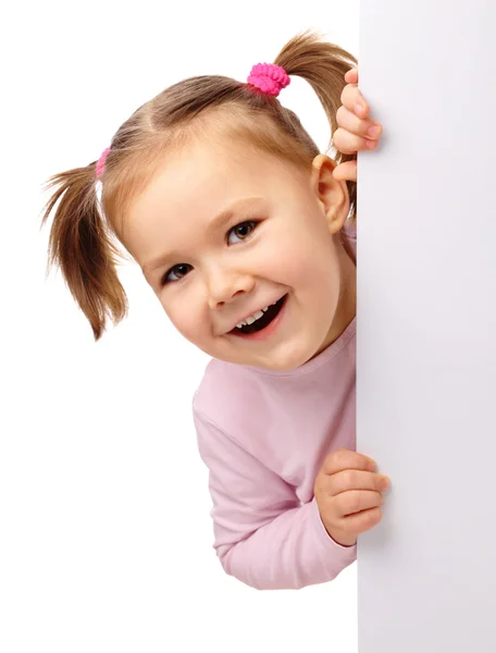Cute little girl with blank board — Stock Photo, Image