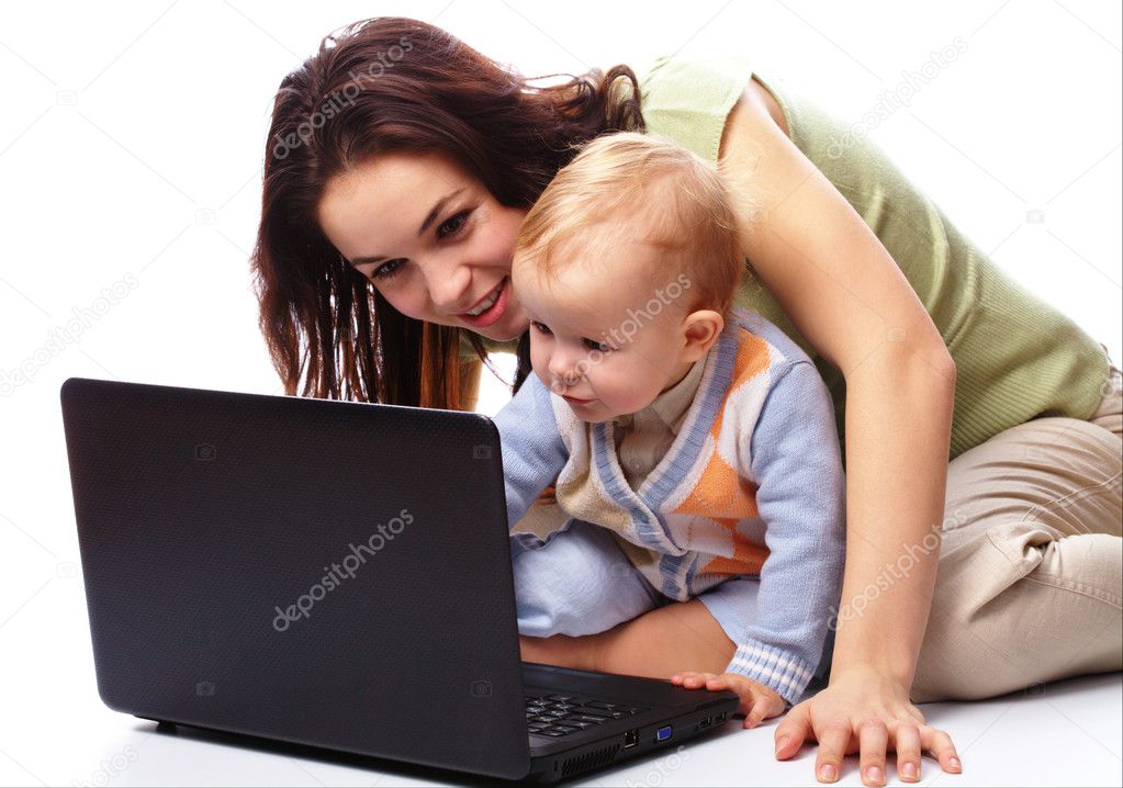Mother an her son are playing with laptop