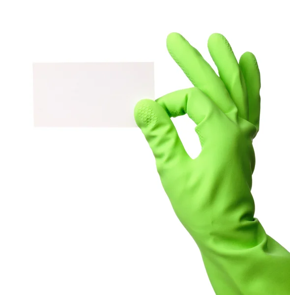 在显示空白名片 白上孤立的绿色橡胶手套手 — 图库照片