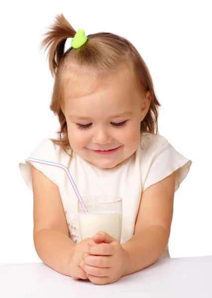 Little girl with a glass of milk — Stock Photo, Image