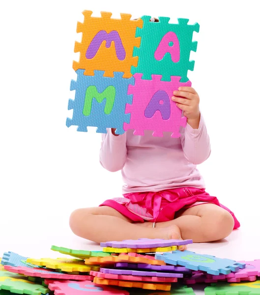 Cute Little Girl Playing Alphabet While Sitting Floor Isolated White — Stock Photo, Image