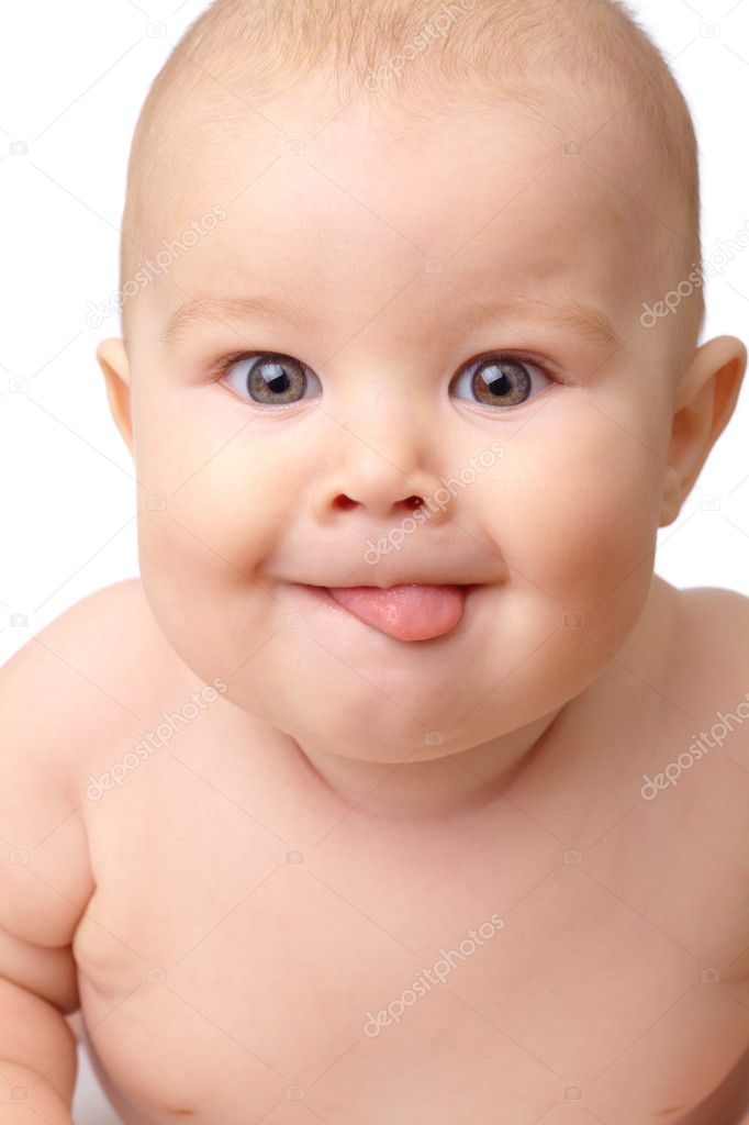 Happy toddler smiling, sticking his tongue out, isolated over white