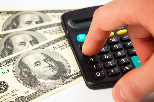 Kalkulator i pieniądze - pojęcia rachunkowości — Zdjęcie stockowe