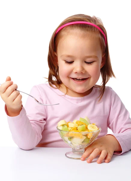 Cute Little Girl Eats Fruit Salad Using Fork Isolated White — Stock Photo, Image