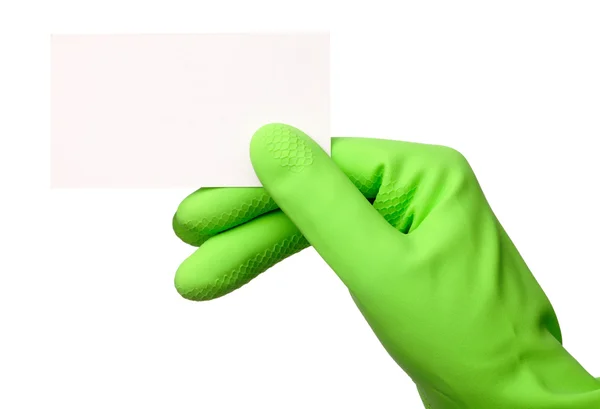 Hand in grünem Handschuh zeigt Visitenkarte — Stockfoto