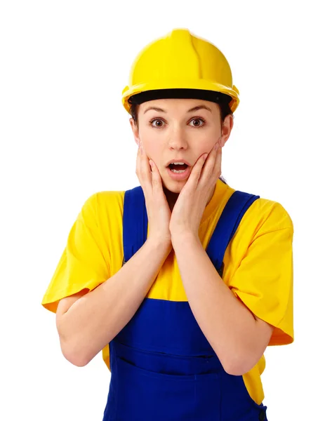 Construction girl holding her face in astonishment — Stock Photo, Image