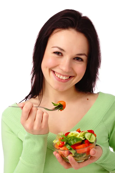 Νέα ελκυστική γυναίκα τρώει σαλάτα λαχανικών — Φωτογραφία Αρχείου