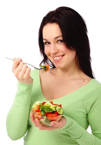 Young attractive woman eats vegetable salad — Stock Photo, Image