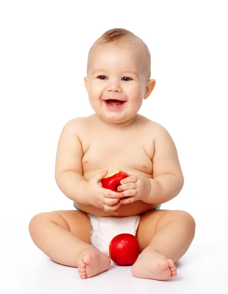 Litet barn med äpple — Stockfoto