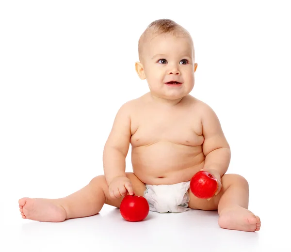 Criança pequena com maçã — Fotografia de Stock